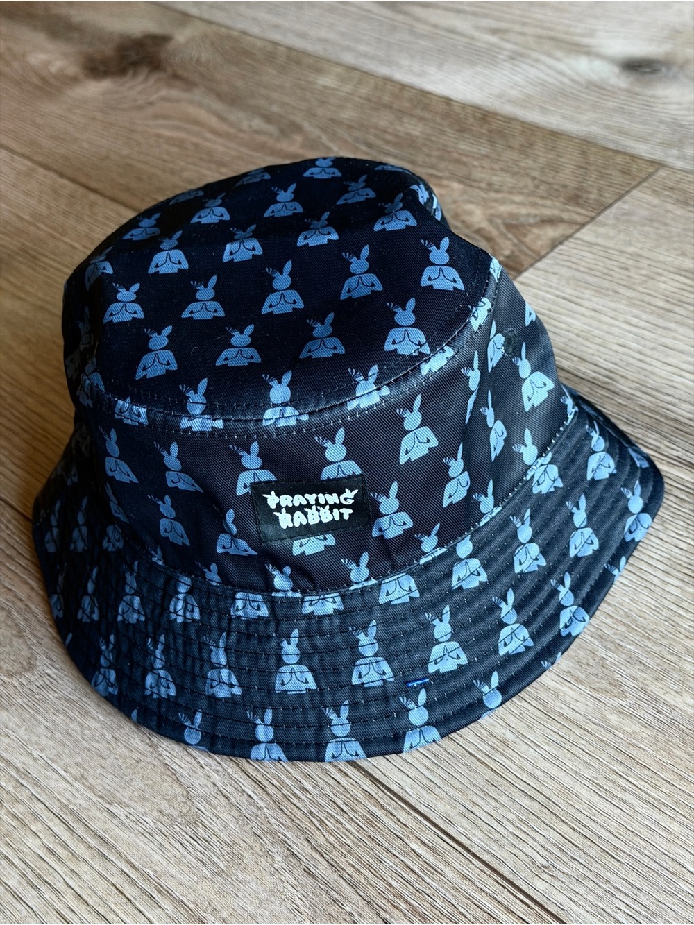 Praying Rabbit Pattern Bucket Hat Black with Light Blue Print